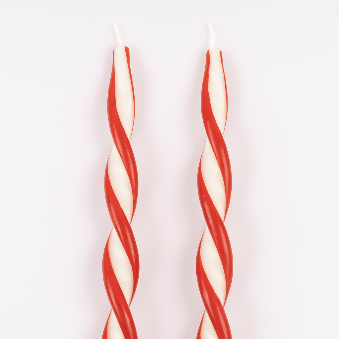 Add a colourful look to your Christmas table with our ivory candles with a stunning twist of red. Image4
