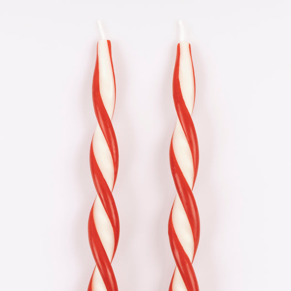 Add a colourful look to your Christmas table with our ivory candles with a stunning twist of red. Image4