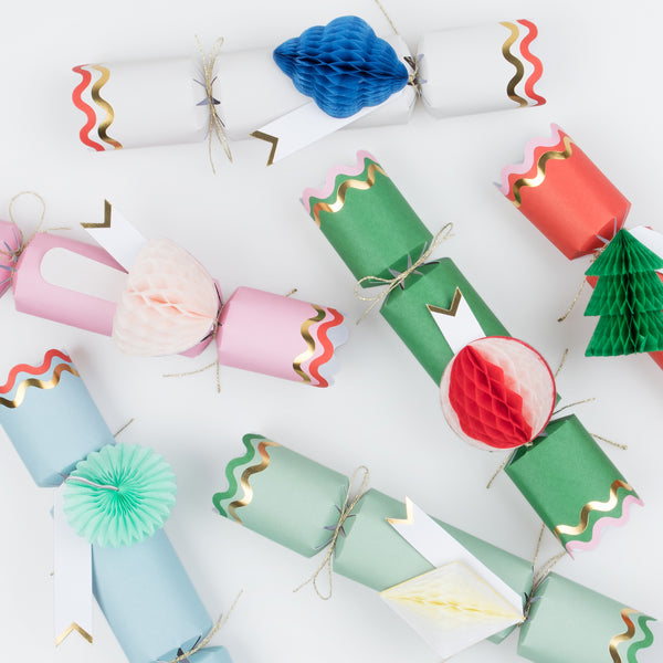 Our honeycomb crackers are colourful and stylish, and contain fun gifts, a party hat and a joke. Image5