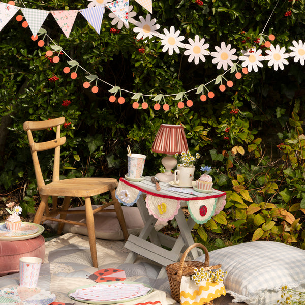Our pretty birthday garlands, made from paper, feature soft blue, pink and white tones with a birthday message, flowers, cherries and scallops. Image2