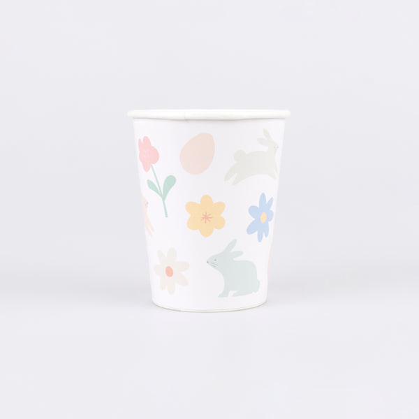 Our paper cups are perfect to add to your Easter party supplies, featuring charming Easter icons like bunnies, carrots and flowers. Image1
