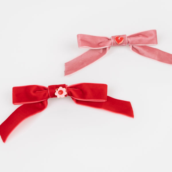 Our Valentine's hair accessories, made with soft velvet bows and enamel charms, make great Valentine's day gifts. Image3