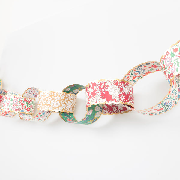 Use our paper chain garland, with Liberty prints in festive colours, as the ideal Christmas hanging decorations. Image3