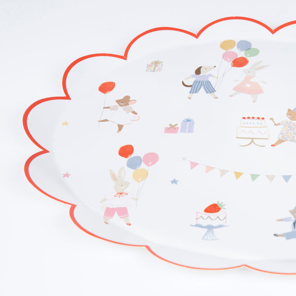 Our Animal Friends party set is ideal for first birthdays, featuring adorable tableware, party bags, party hats and a large paper garland. 