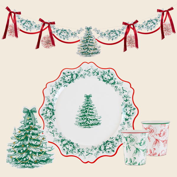 Our elegant Christmas range features a Toile du Jouy design in red and green, with plates, napkins, cups and a stylish paper garland. Image1