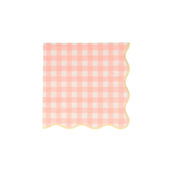 Our paper napkins with a gingham print and scalloped edge will look amazing on your party table. Image2