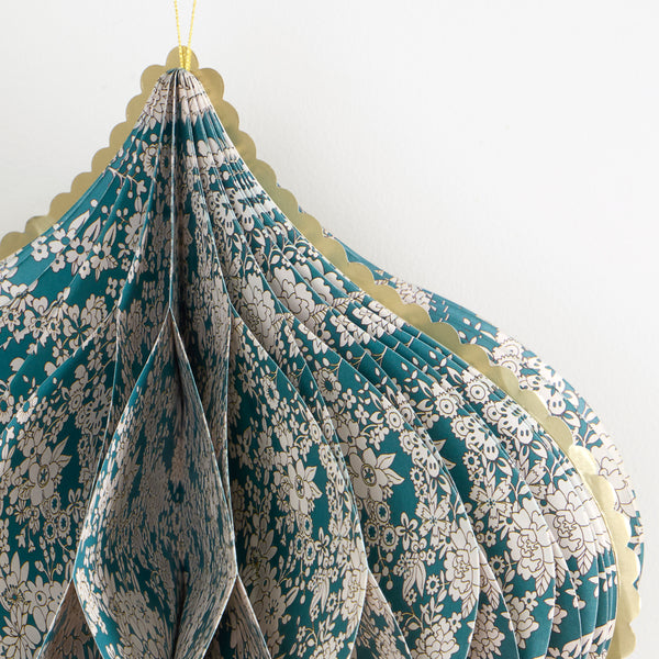 Our large Christmas decorations feature 3D honeycomb details, Liberty print designs in rich seasonal colours, tassels and satin ribbons. Image3