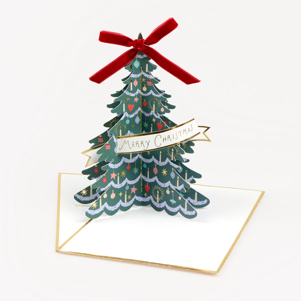 Our Christmas tree card is a statement 3D shape and is topped with a red velvet bow for a chic look, perfect to send to a special someone. Image1