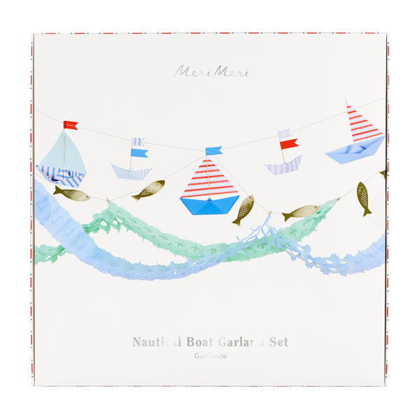 Add a touch of seaside fun to your nautical party with our special paper garland set, featuring striped boats, shiny fish and honeycomb waves. Image4