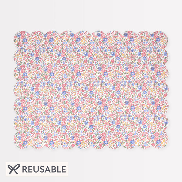 Our rectangle placemat features a scalloped edge and pretty Liberty floral print design, with a laminated durable finish and cork backing. Image1