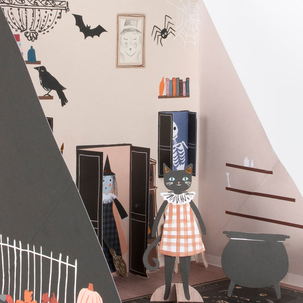 If you're looking for a Halloween toy then this play house, with a paper doll cat and lots of Halloween stickers , is perfect. Image3