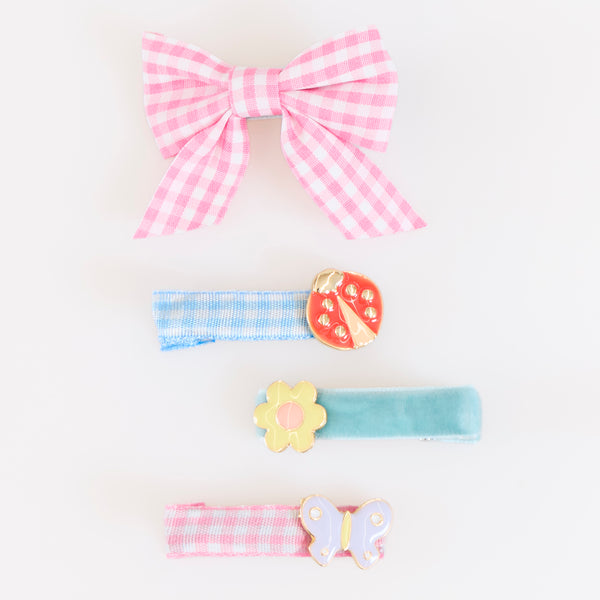 Our hair clip set features 8 designs, with enamel butterflies, flowers and ladybugs, and gingham and velvet ribbons, such stylish accessories. Image4