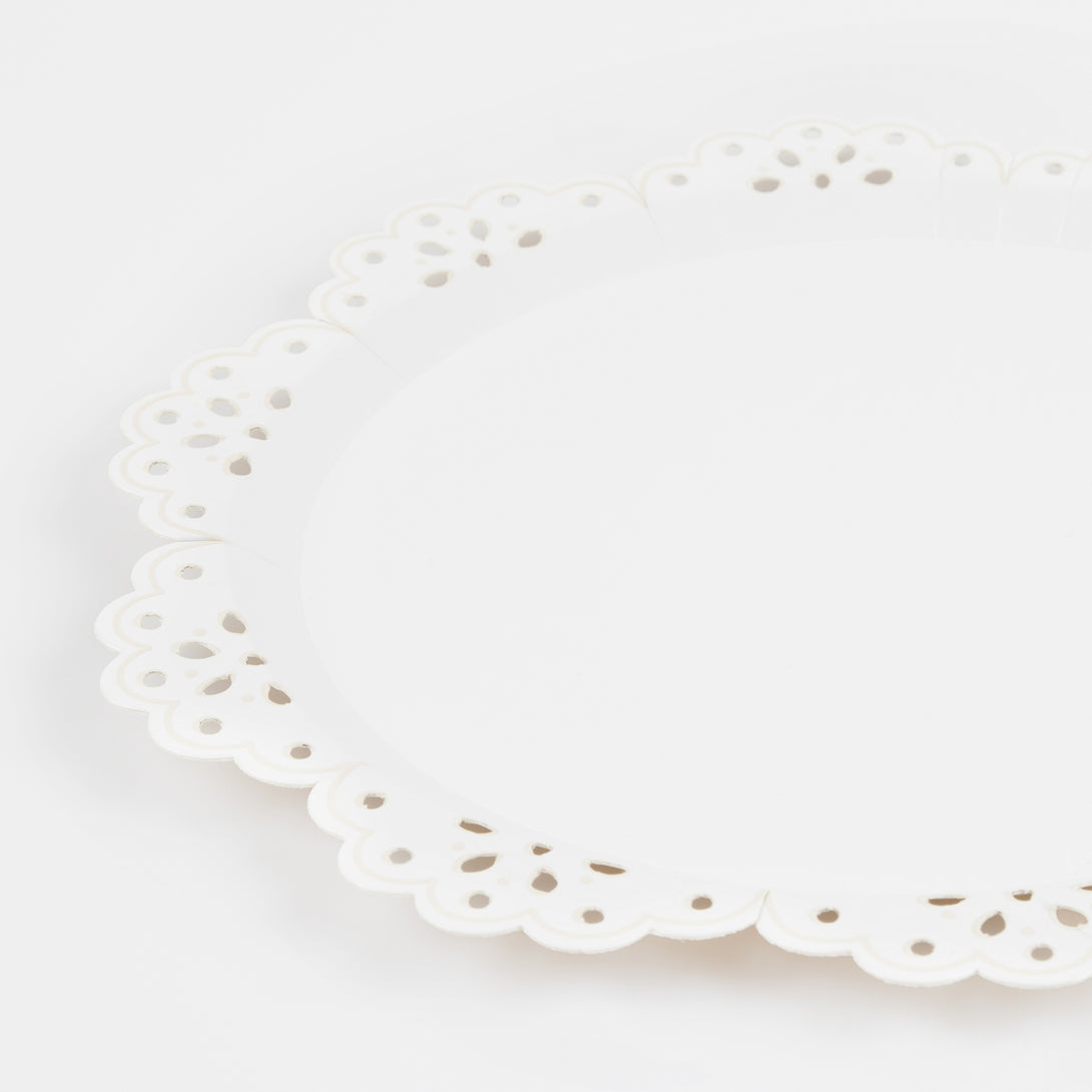 Our paper side plates have a pretty lace design, with embossed details, ideal as baby shower plates.