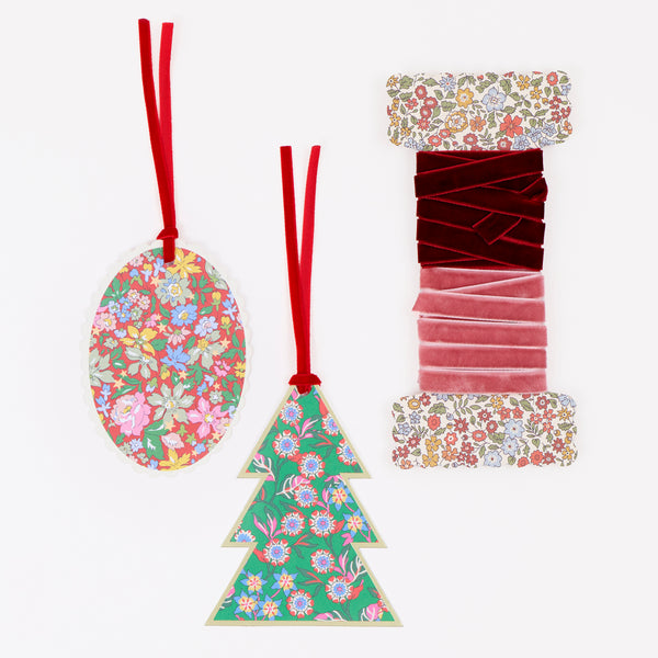 Our advent calendar is beautifully presented in a large Liberty print design box with 24 boxes inside containing stationery and decorations. Image10