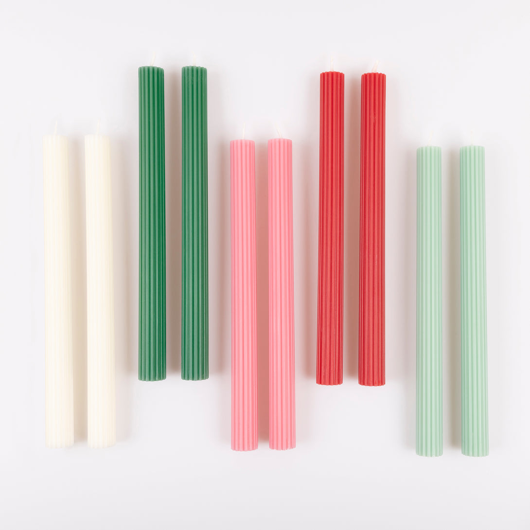 Our Christmas candle gift box features 10 ridged table candles, in 5 joyful colours, presented in a box with a classic Liberty print designs. Image4