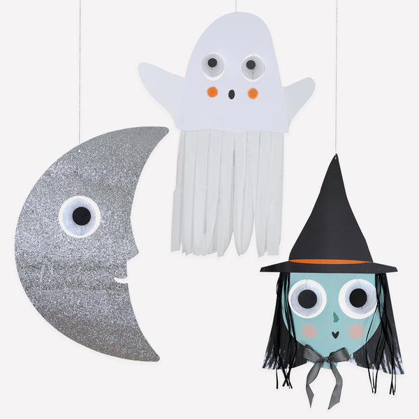 Our giant Halloween decorations set, especially designed for hanging, includes a witch, ghost and moon with fun honeycomb dangling eyeballs. Image1