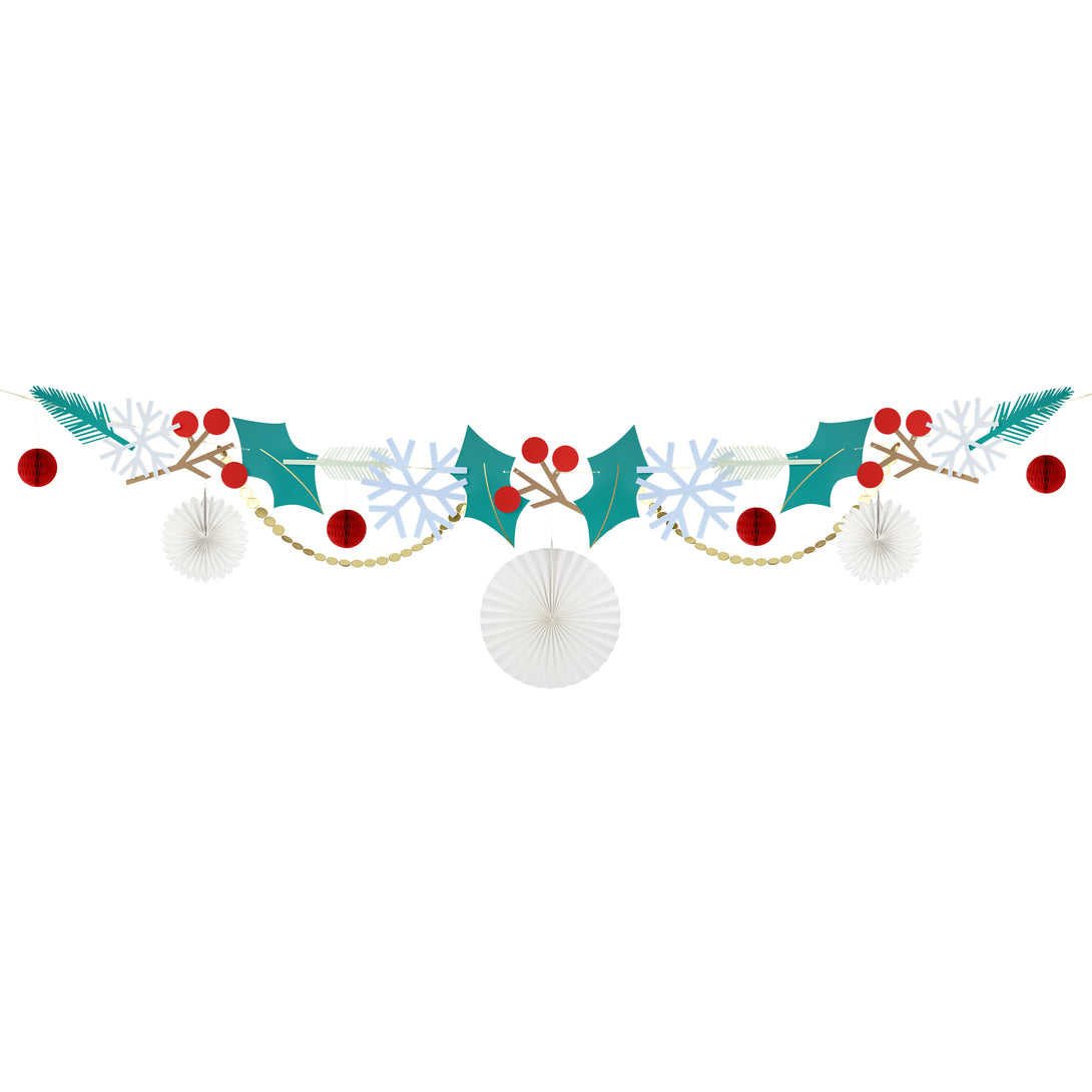 Our Christmas garland includes Christmas foliage with paper holly, berries, snowflakes and honeycomb decorations.