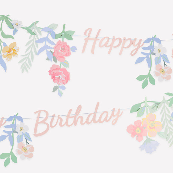 Our birthday decoration features the words Happy Birthday in pink, with 12 flower and leaf pennants to attach to create a pretty garland. Image1