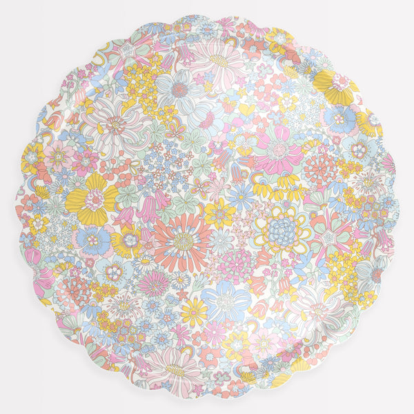Our round tray has a floral Liberty print design, and is made from birch veneer plywood with a melamine coating, for practicality and style. Image1