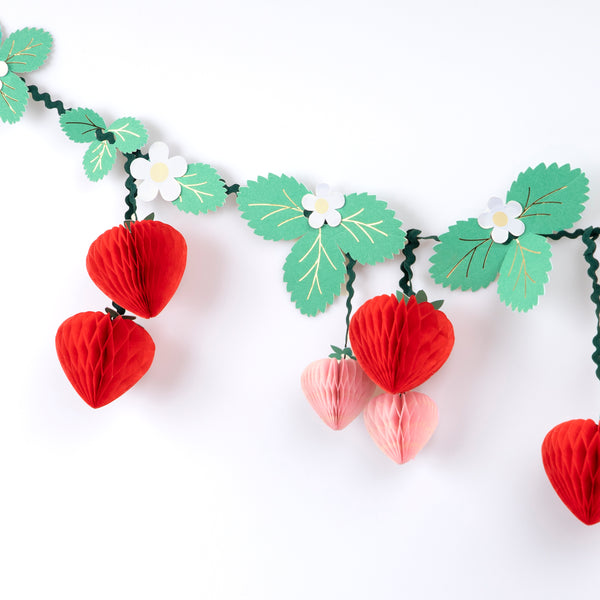 Our party garland has 3D strawberry pennants, with flowers, leaves and green ricrac ribbons, great as summer party decor. Image3