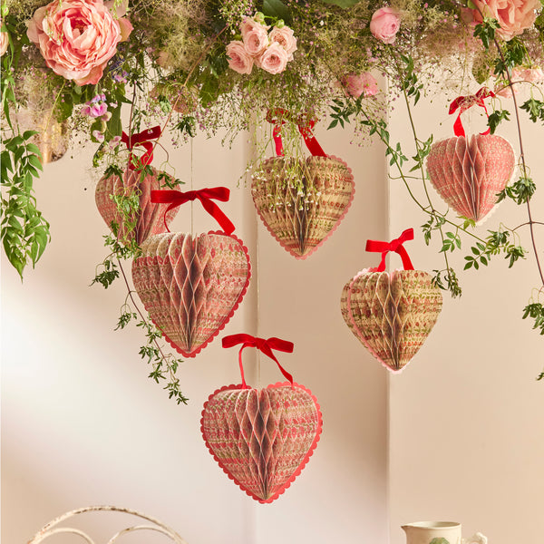 Our honeycomb hearts make wonderful Valentine's decorations. They're made with Liberty floral print designs and elegant velvet bows. Image2