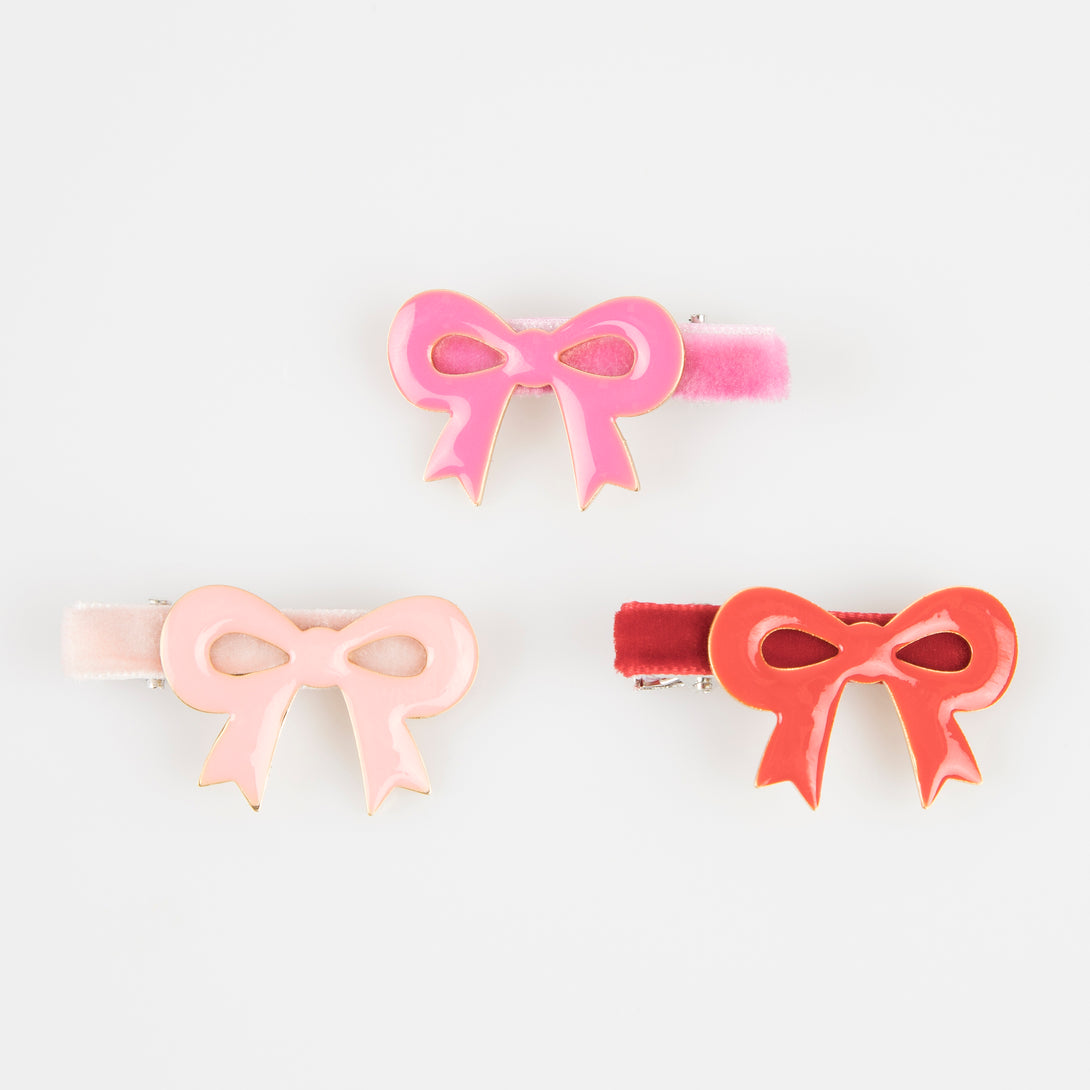 Our luxury red and pink hair clips feature enamel bows and velvet ribbons - the perfect Valentine's hair accessories for kids. Image4