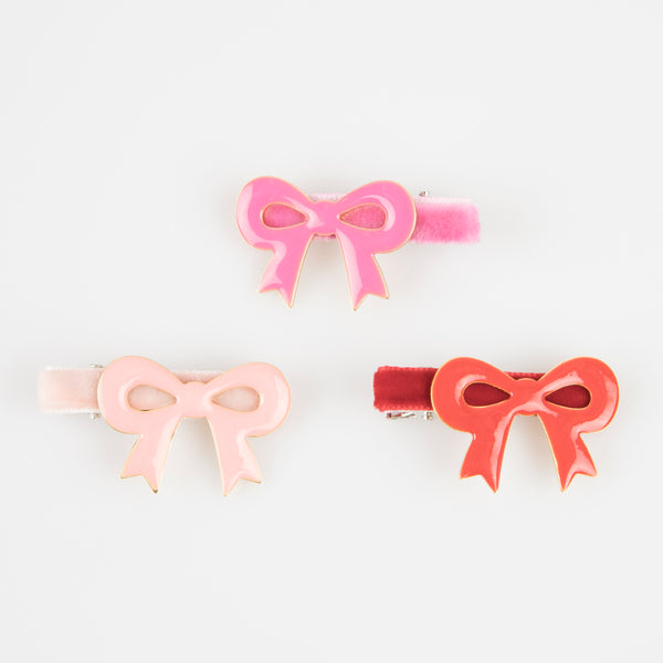 Our luxury red and pink hair clips feature enamel bows and velvet ribbons - the perfect Valentine's hair accessories for kids. Image4