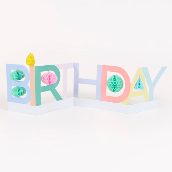 Our 3D Birthday cards opens out to reveal the word 'Birthday' in vibrant letters with 3D honeycomb details for a fun effect. Image1