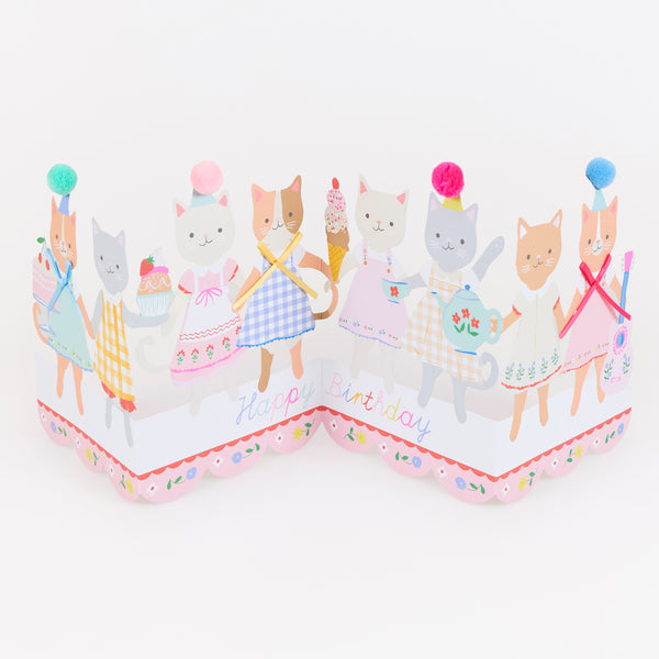 Send a special birthday card to someone who loves kittens with our delightful concertina card with special bow and pompom embellishments. Image1