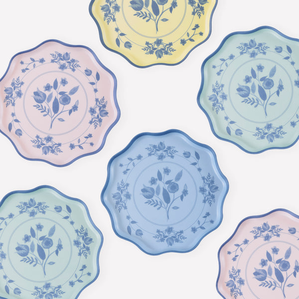 Our reusable plates, made from melamine in a small size, feature four pastel colours with a blue vintage botanical print design transfer. Image1