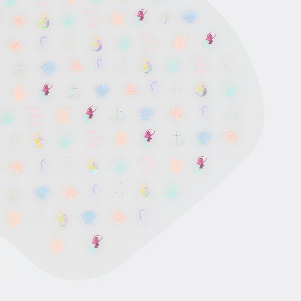 Our set of 200 nail stickers features mermaid and under-the-sea icons with lots of shimmering silver foil, perfect for party fun. Ages 3+. Image3