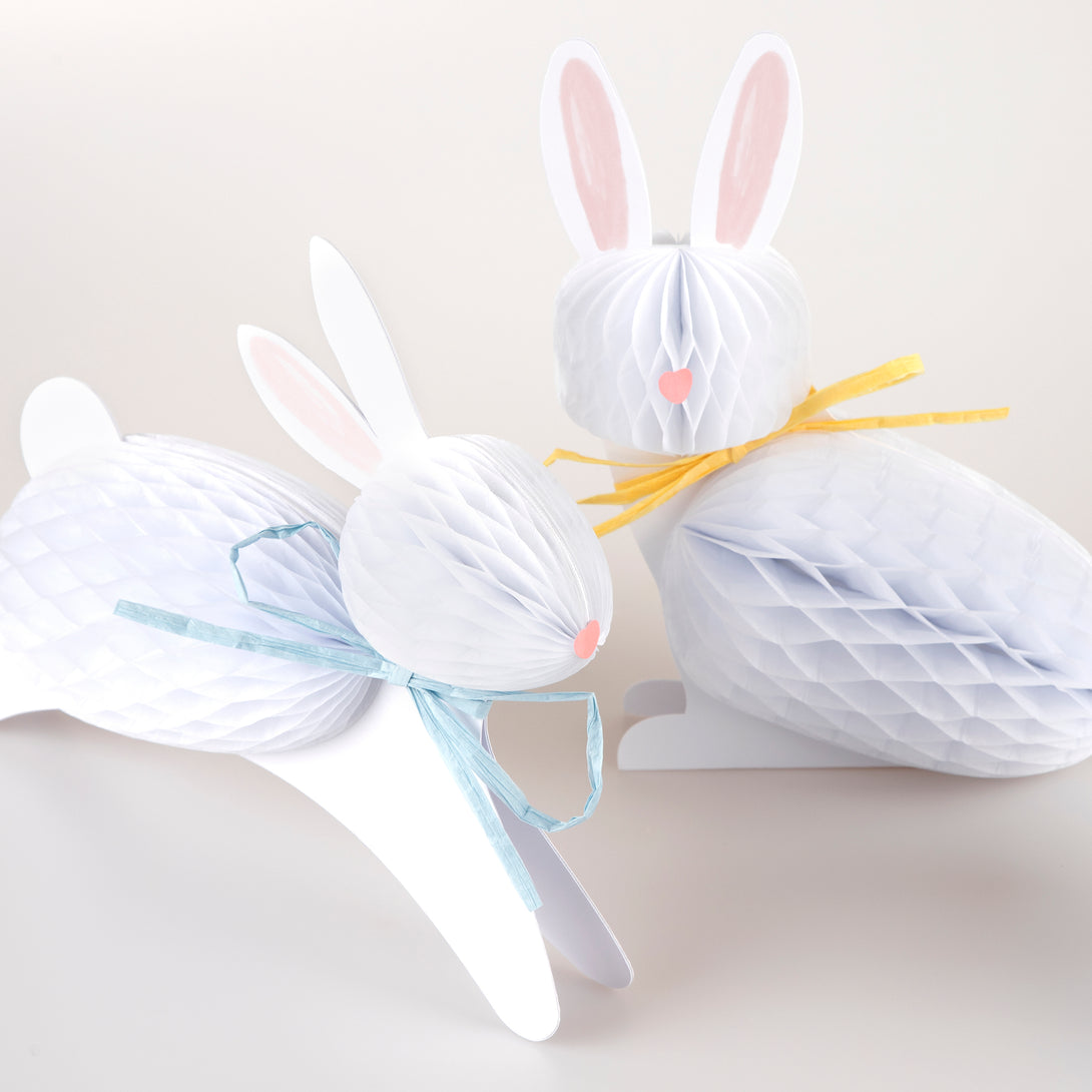 Our Easter bunny decorations, crafted with honeycomb paper and raffia ribbons, look amazing.