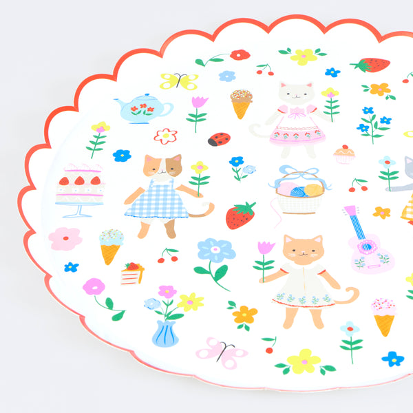 Our folk-inspired paper plates, in a large dinner plate size, feature charming kittens in a magical world, perfect for birthday parties. Image3