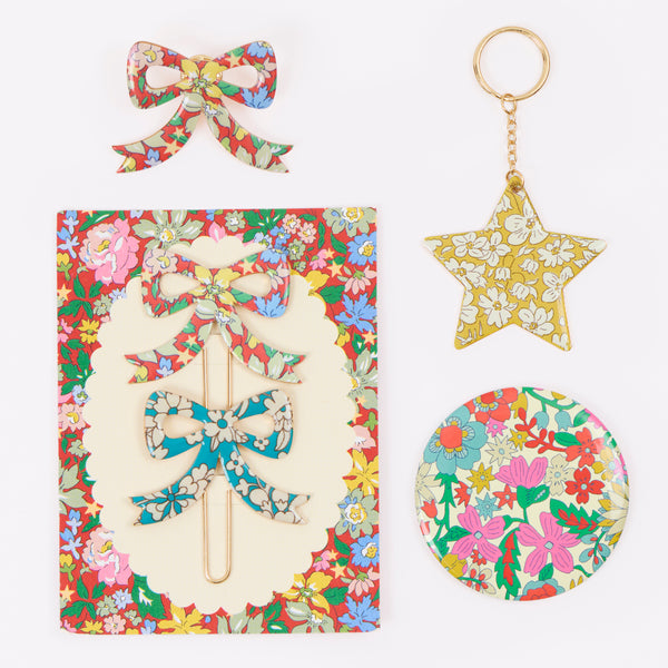Our advent calendar is beautifully presented in a large Liberty print design box with 24 boxes inside containing stationery and decorations. Image9