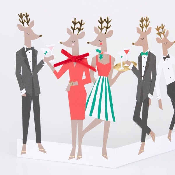 Our fun reindeer card features happy reindeers, with red velvet bow details, the perfect festive card everyone will love to receive. Image2