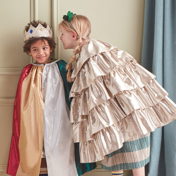 This gorgeous cape, crafted from gold lamé fabric, looks sensational. Image2