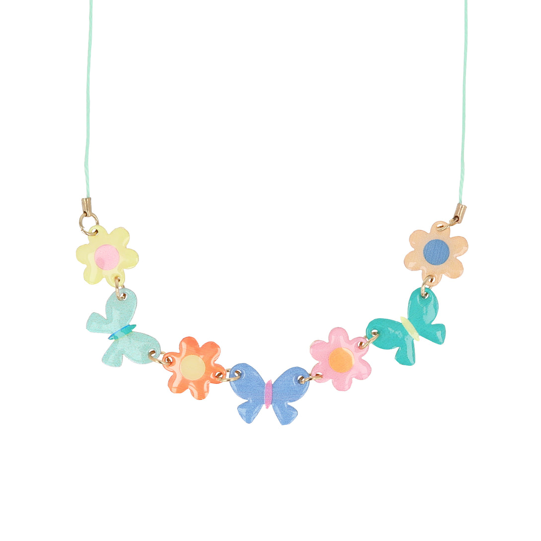 Our springtime charm necklace features enamel butterflies and flowers, a delightful gift.