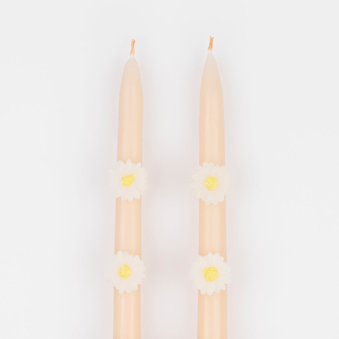 Make your springtime party look amazing with our tall pink candles, decorated with wax daisies, and with pink wicks.