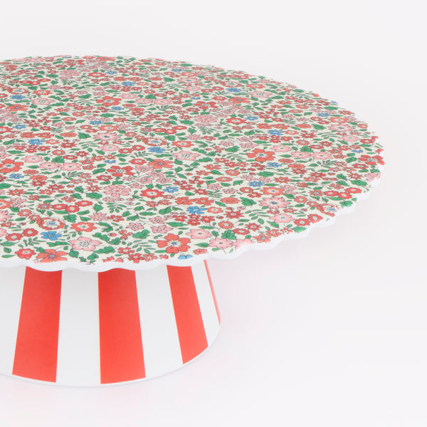 Our Christmas cake stand features a Liberty floral print design, with a striped base, ideal for displaying festive cakes and a lovely host gift. Image2