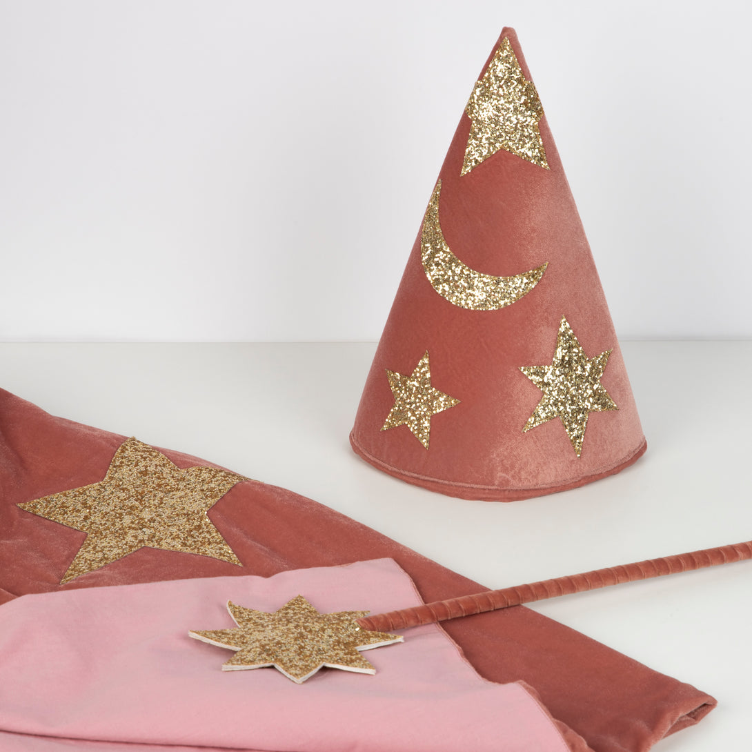 This wizard cape, wizard hat and star wand set, crafted from pink velvet and gold glitter fabric, is a fabulous costume for girls. Image3
