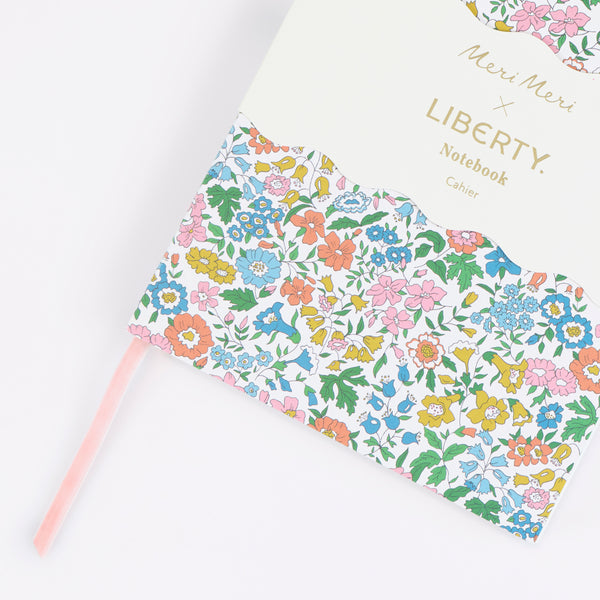 Keep notes or a journal in our beautiful notebook with a floral Liberty print design and a pink velvet ribbon bookmark, a stylish gift for a writer. Image2