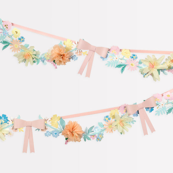 Our paper garland, featuring flowers and bows, is the perfect baby shower garland or Easter garland. Image1