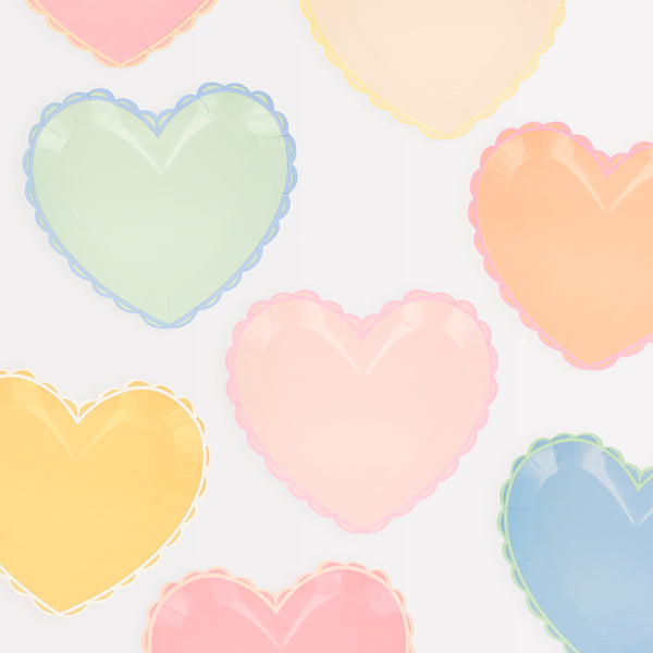 Our small plates, in heart shapes, feature a range of pretty pastel colours and a scalloped border.