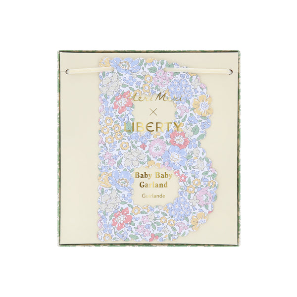 Our paper baby garland, made with classic Liberty designs in soft colours, is ideal for a baby shower or as a nursery decoration. Image3