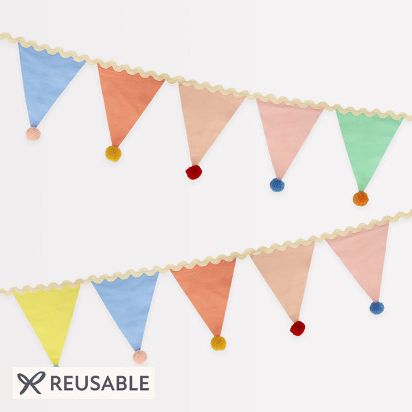 Add a pop of pastel colour to your party table or wall with our flag garland with pompoms. Image1