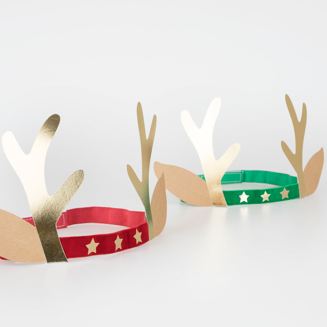 Our antler headbands, with velvet bands, shiny gold stars and antlers, and reindeer ears, make fun Christmas headwear.