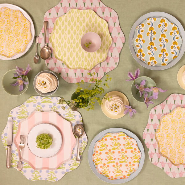 Our pink placemat, made from laminated paper and wood with a cork backing, features a pretty tulip Molly Mahon design. Image2