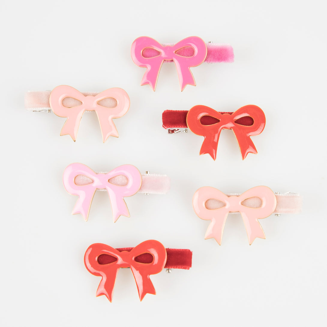 Our luxury red and pink hair clips feature enamel bows and velvet ribbons - the perfect Valentine's hair accessories for kids. Image3