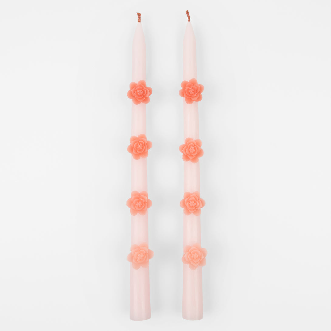 Make any pink party look amazing with our taper candles with pink flowers and pink wicks.