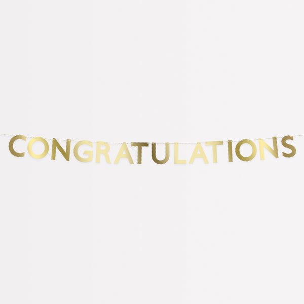 Our paper garland, with shiny gold foil, spells out congratulations, and is perfect to celebrate special moments.